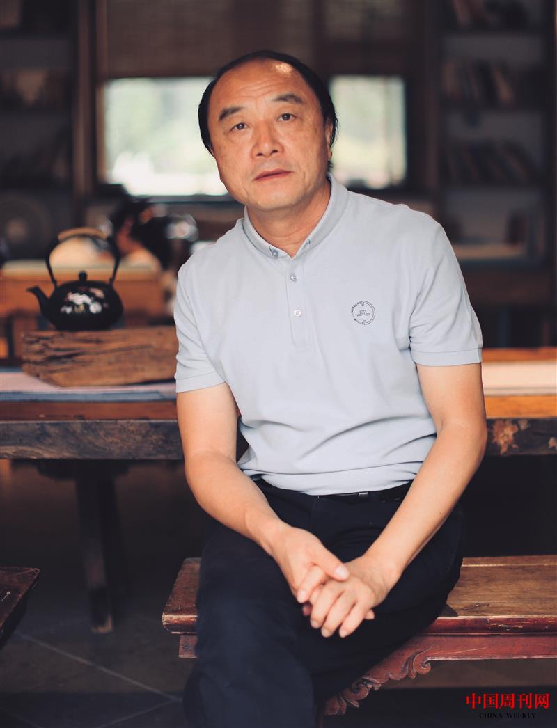 周剛個人照片.jpg